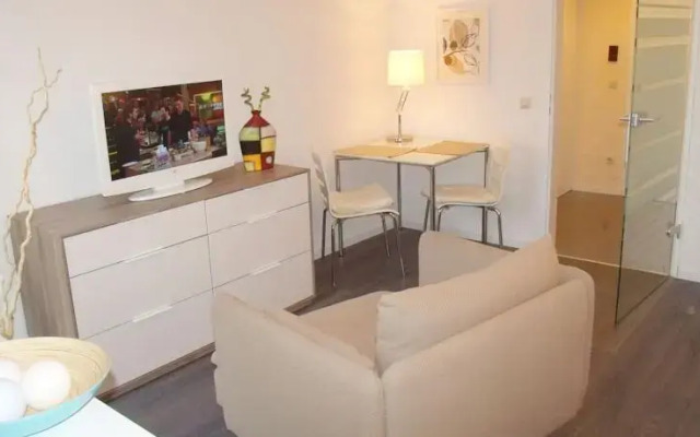 Апартаменты Business meets Düsseldorf Apartments комната для гостей