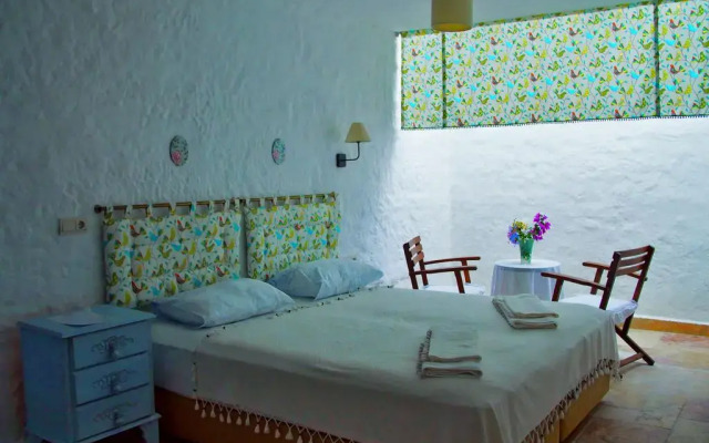 Отель Dort Mevsim Alacati Чешме комната для гостей