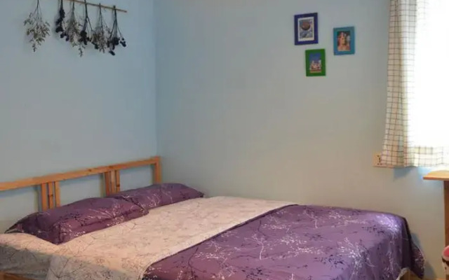 Отель Shenzhen Nanao Caichongju Homestay No.1 Branch комната для гостей