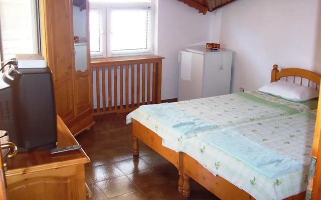 Отель T&D GuestHouse Suites комната для гостей