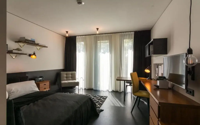 Апартаменты The Spot - Serviced Apartments Мюнхен комната для гостей