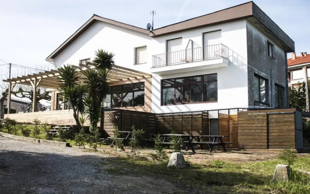 Отель Fin Surf House вид на фасад