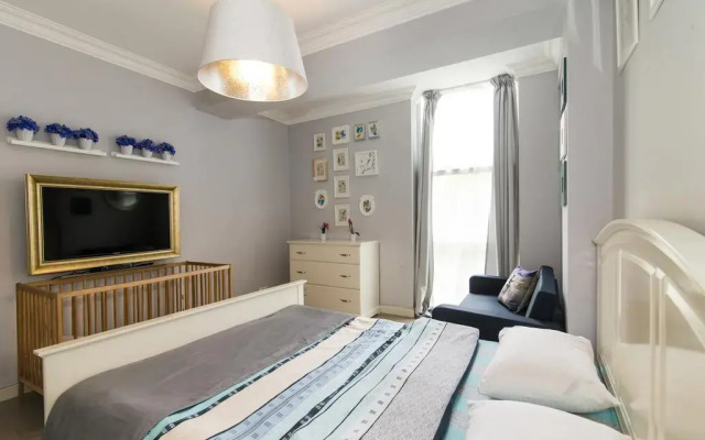 Гостиница Alpha Apartments Voykova в Сочи отзывы, цены и фото номеров - забронировать гостиницу Alpha Apartments Voykova онлайн комната для гостей