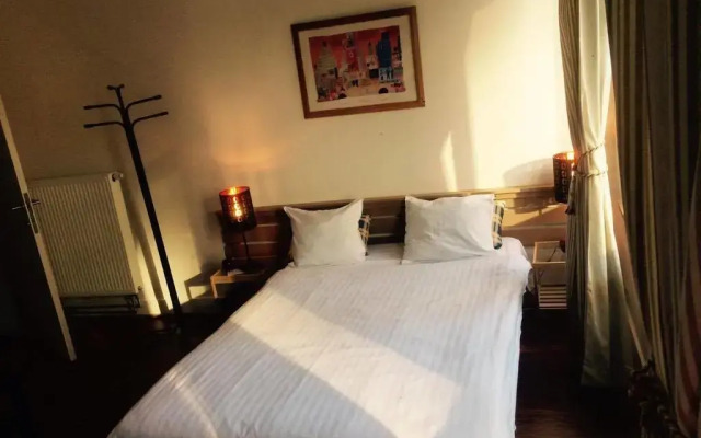 Отель Appart-hôtel Maison de la Lune - petite Auberge d'Etterbeek комната для гостей
