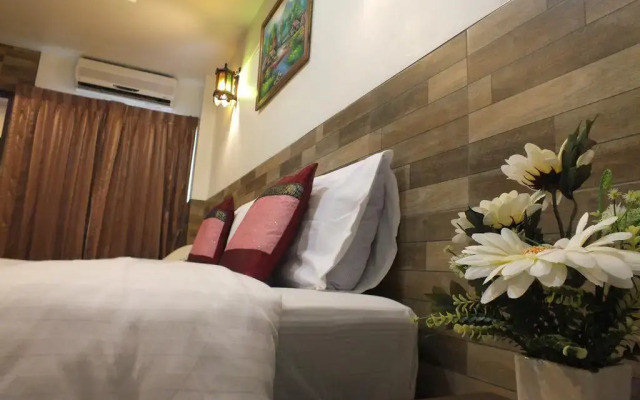 Апартаменты Chaba Garden Apartment Паттайя комната для гостей
