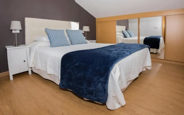 Апартаменты Apartments Llanes & Golf комната для гостей