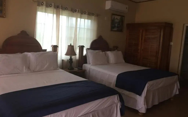 Отель Brytan Villa Ямайка, Треже-Бич - отзывы, цены и фото номеров - забронировать отель Brytan Villa онлайн комната для гостей