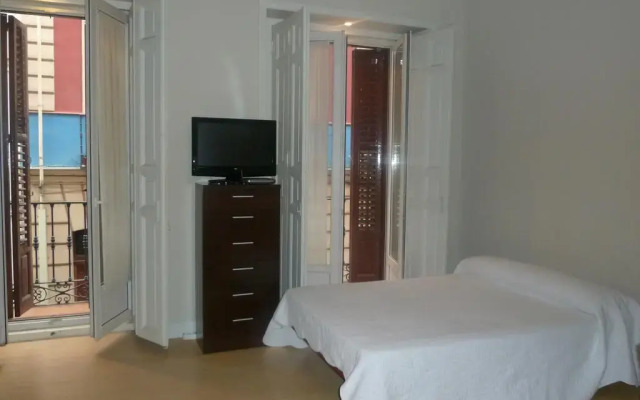 Отель Apartamentos del Prado Мадрид комната для гостей