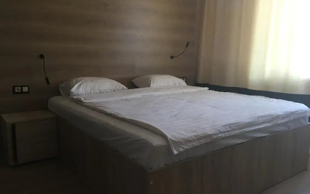 Гостиница Postoyaliy Dvor Inn в Уссурийске отзывы, цены и фото номеров - забронировать гостиницу Postoyaliy Dvor Inn онлайн Уссурийск комната для гостей