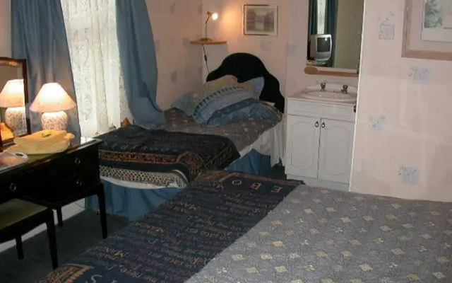 Отель All Seasons Guesthouse Манчестер комната для гостей