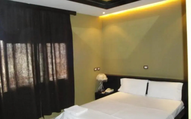 Epidami Hotel комната для гостей