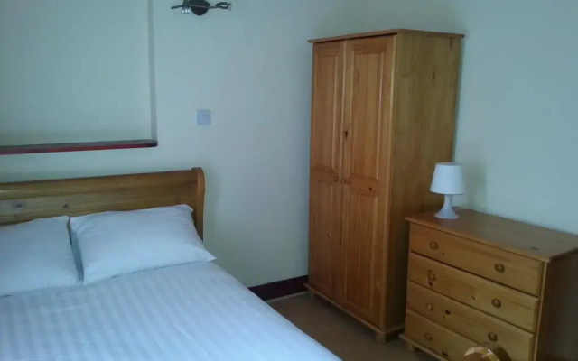 Апартаменты Kensington and Chelsea Apartment комната для гостей