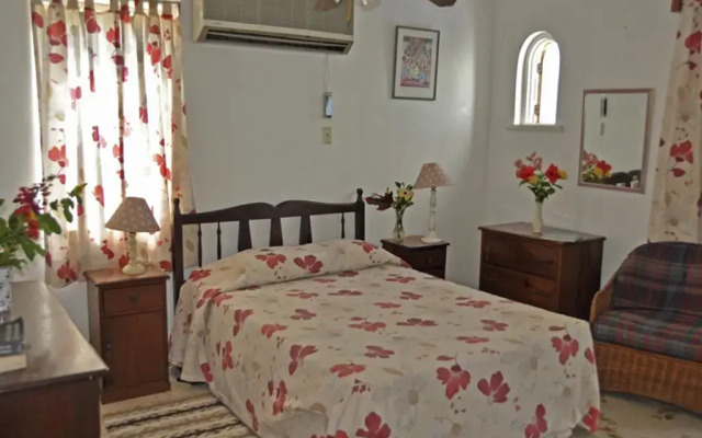 Отель Carib Beach Apartments Negril Ямайка, Вестморленд - отзывы, цены и фото номеров - забронировать отель Carib Beach Apartments Negril онлайн комната для гостей
