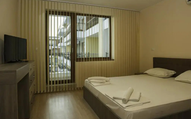 Апартаменты Garden of Eden PMG Apartments комната для гостей