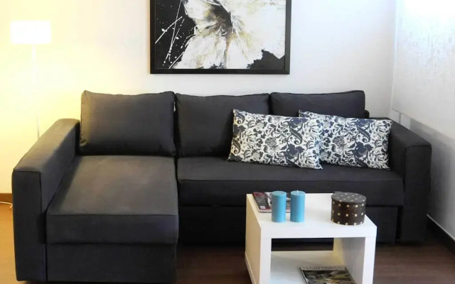 Апартаменты Your Home In Barcelona Apartments Барселона комната для гостей