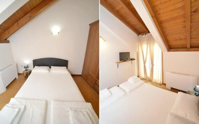 Апартаменты Tianis Apartments комната для гостей