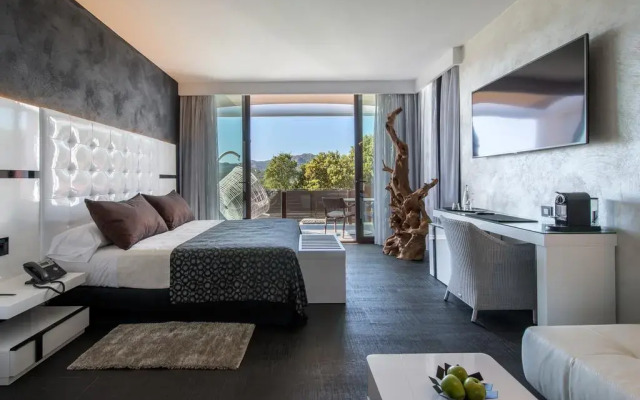 Отель Mas Tapiolas Suites Natura комната для гостей