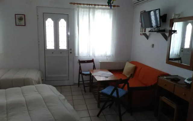 Апартаменты Anthos Apartments комната для гостей