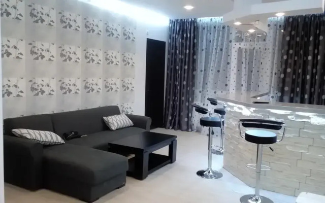 Апартаменты La'Tuka Apartments комната для гостей