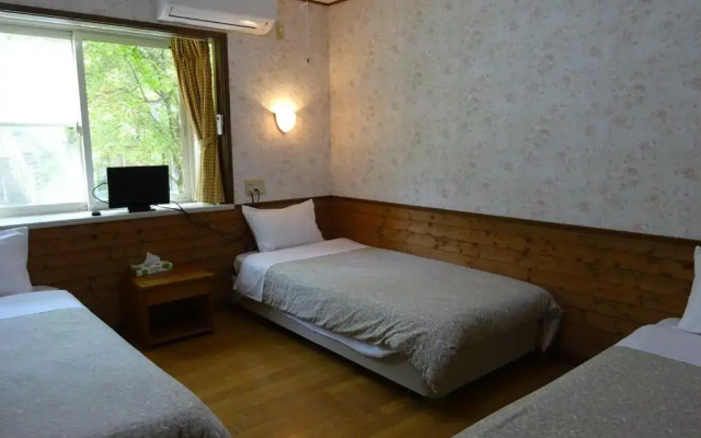 Отель Step House Яманакако комната для гостей