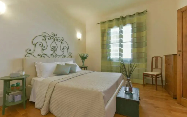 Апартаменты Palazzo Uguccioni Apartments Флоренция комната для гостей
