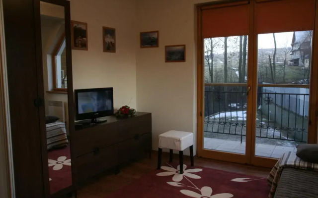 Отель Apartament Olcza Поронин комната для гостей