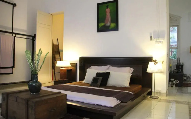 Отель Chez Pham District 3 French Villa комната для гостей