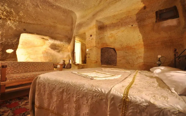 Sinasos History Cave Hotel комната для гостей