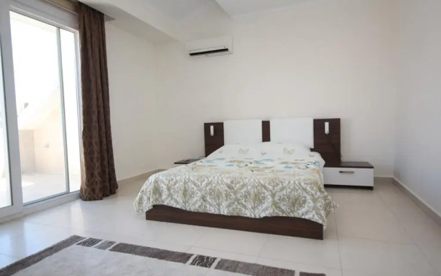 Апартаменты Douplex Apartment in Orion City комната для гостей