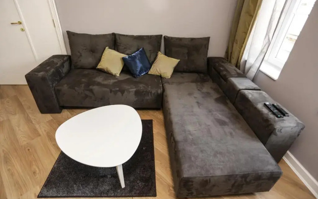 Апартаменты Moment Boutique Apartment комната для гостей