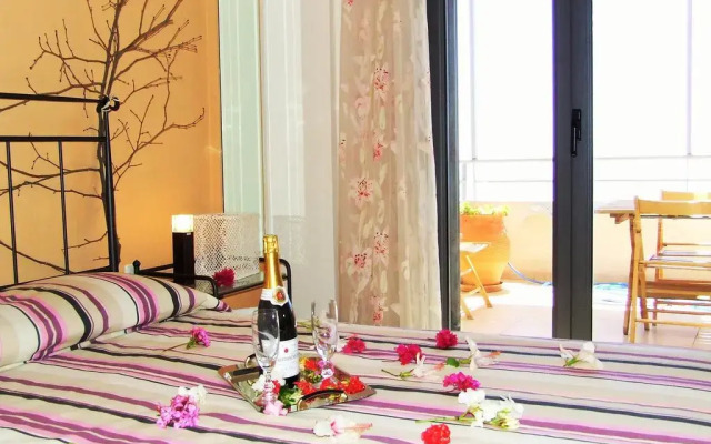 Отель Anemos Luxury Villas комната для гостей