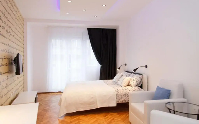 Апартаменты Stay In Apartments комната для гостей