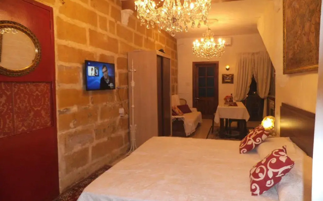 Отель Studio Apartment Marsaxlokk Мальта, Марсашлокк - отзывы, цены и фото номеров - забронировать отель Studio Apartment Marsaxlokk онлайн комната для гостей