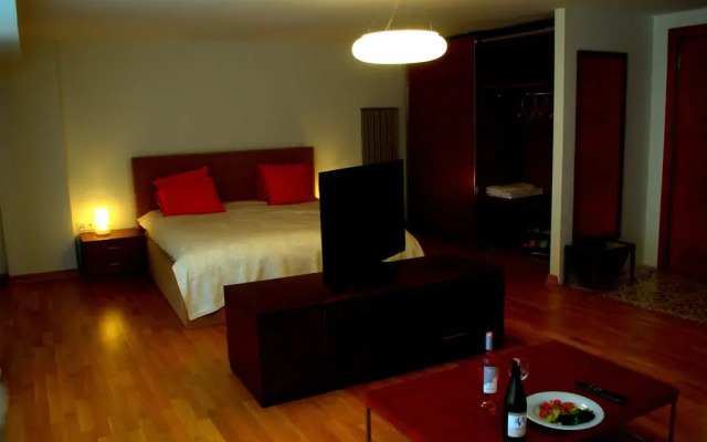Отель Casa Rosso Suites комната для гостей