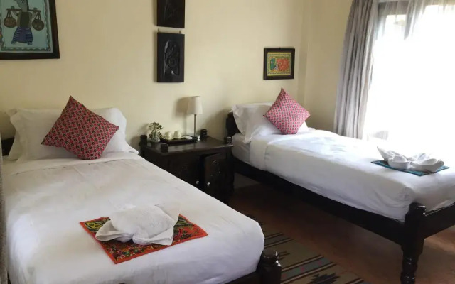 Отель Mingtang Garden Cottage 名堂花园度假屋 Непал, Покхара - отзывы, цены и фото номеров - забронировать отель Mingtang Garden Cottage 名堂花园度假屋 онлайн комната для гостей