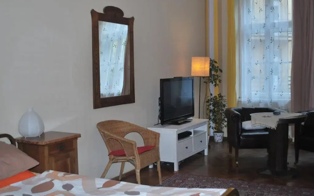 Апартаменты Apartment Pstrossova Прага комната для гостей