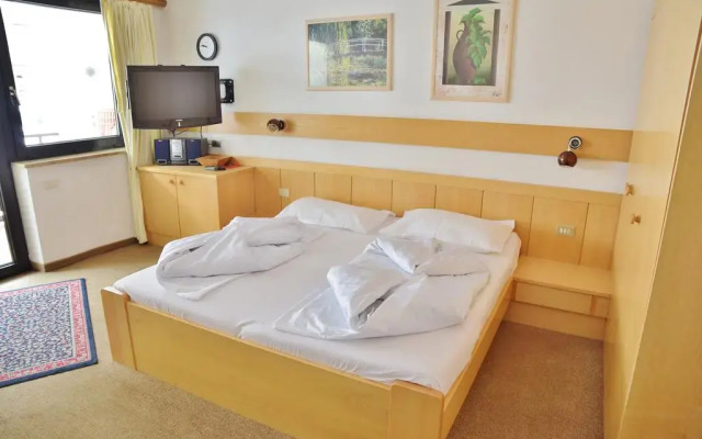 Отель Alpina Residence Стельвио комната для гостей