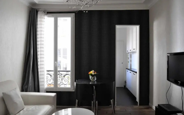 Апартаменты Modern Apartment Montmartre Sacré-Coeur - Smartrenting комната для гостей