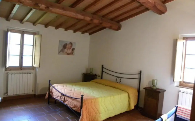 Отель Agriturismo Montassi E Bruscolaio Монтеварчи комната для гостей