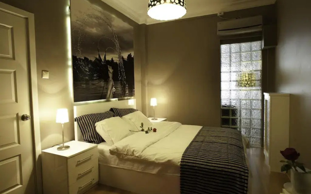 Отель Swiss Suites комната для гостей
