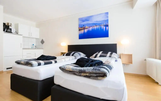 Отель Centerapartments Am Wehrhahn Германия, Дюссельдорф - отзывы, цены и фото номеров - забронировать отель Centerapartments Am Wehrhahn онлайн комната для гостей