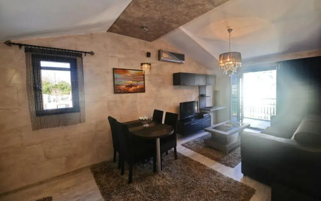 Апартаменты Dekaderon Lux Apartments комната для гостей
