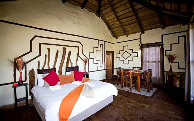 Отель Addo Palace Bush Huts комната для гостей