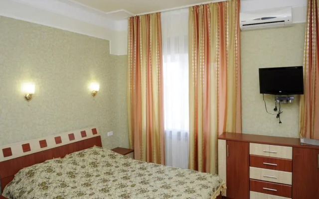 Hotel Naberzhnyi Бердянск комната для гостей