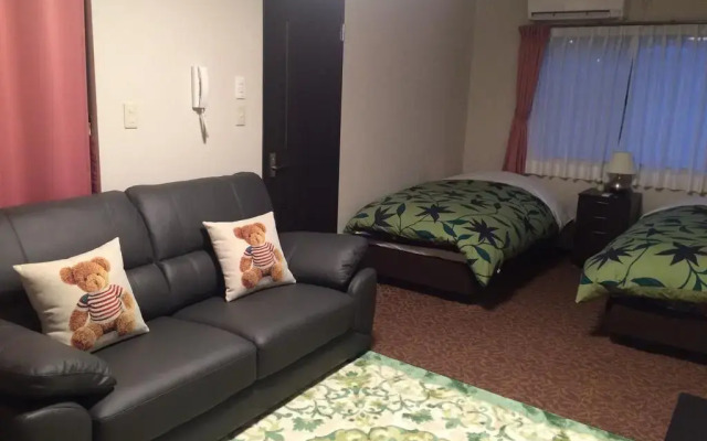 Отель Villa Locagarden Яманакако комната для гостей