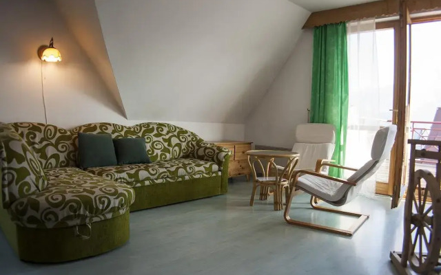 Отель Apartament Nefryt Косцелиско комната для гостей