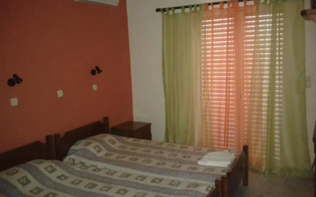 Отель Yiannis Apartments Греция, Калимнос - отзывы, цены и фото номеров - забронировать отель Yiannis Apartments онлайн комната для гостей
