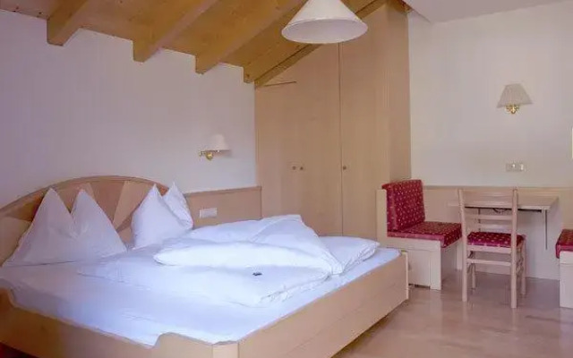 Отель Residence Aster Стельвио комната для гостей