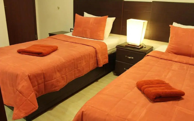 Отель Daraghmeh Hotel Apartments - Jabal El Webdeh Иордания, Амман - отзывы, цены и фото номеров - забронировать отель Daraghmeh Hotel Apartments - Jabal El Webdeh онлайн комната для гостей