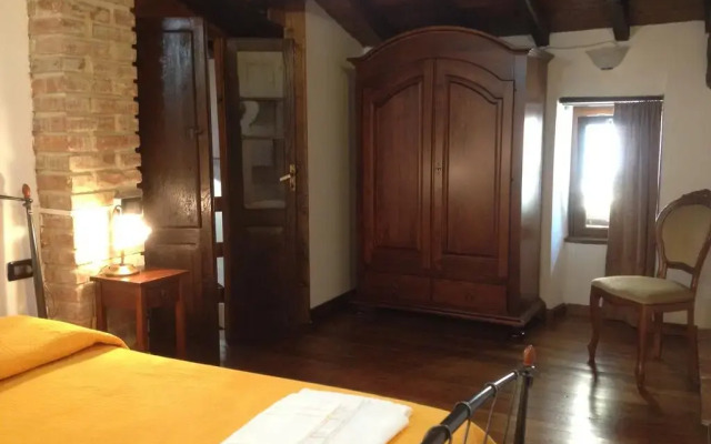 Отель Casa Vacanze Sotto l'Arco Италия, Л'Акуила - отзывы, цены и фото номеров - забронировать отель Casa Vacanze Sotto l'Arco онлайн комната для гостей